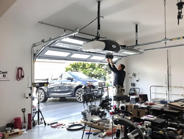 Longmeadow Garage Door Repair specialist installing smart garage door opener system in Longmeadow home
