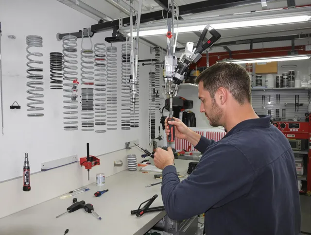 Longmeadow Garage Door Repair safety certified technician performing precision spring replacement in Longmeadow